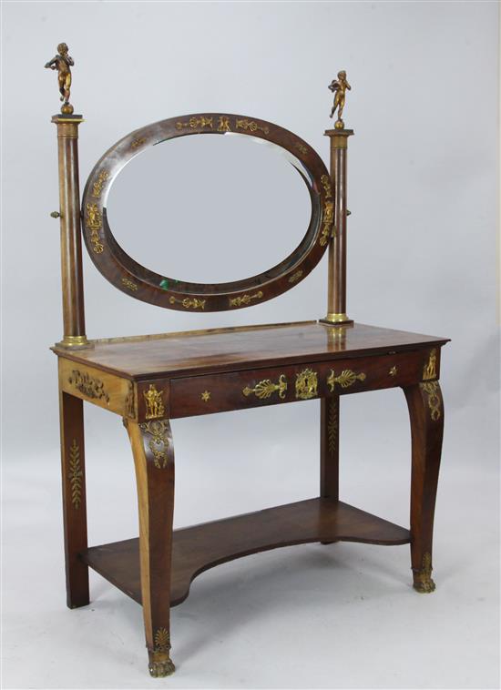 A French Empire ormolu mounted flame mahogany dressing table, W.3ft 5in. D.1ft 9in. H.5ft 3in.
